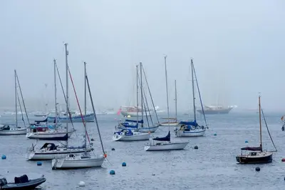 a group of boats floating in the water at Spectacular Waterfront Views With Parking At 'Mariners Mirror' in Falmouth