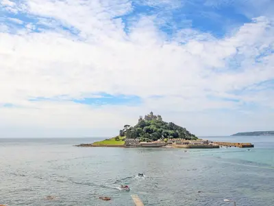 an island with a castle on it in the water at Long Barn in Penzance