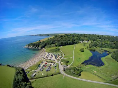 an aerial view of a beach and the ocean at Two Bedroomed Holiday Cottage with Sea Views in St Austell