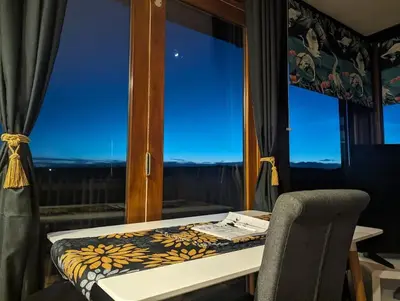 a room with a window with a desk and a chair at Woodpecker Lodge- A Pet Friendly Rural Retreat in Callington