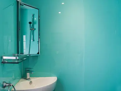 a bathroom with a sink and a mirror at Bray View Cottage in Davidstow