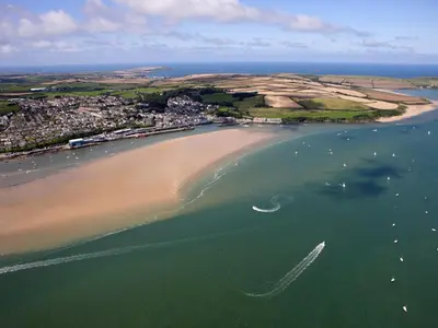 an aerial view of a beach with boats in the water at The Boat House in Padstow