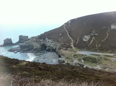 an aerial view of the ocean and a mountain at Gwel-an-Tansys in St. Agnes
