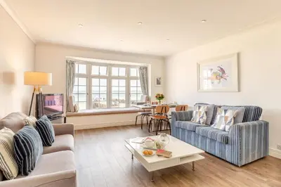 a living room with two couches and a table at 2 Bed in St. Ives oc-h28027 in St Ives