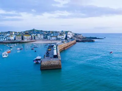 an aerial view of a pier with boats in the water at 2 Bed in St. Ives oc-h28027 in St Ives