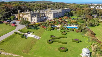 an aerial view of a mansion with a garden at Tregenna Castle Self Catering in St Ives