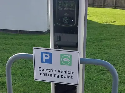 a parking meter with an electric vehicle charging point at Holiday Home - St Austell in St Austell