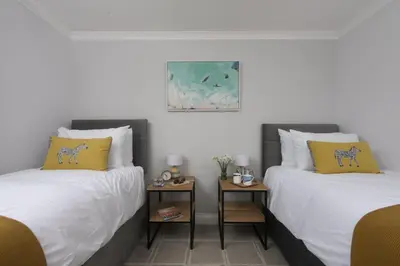 two beds sitting next to each other in a room at 7 Wheal Ayr, St Ives in St Ives