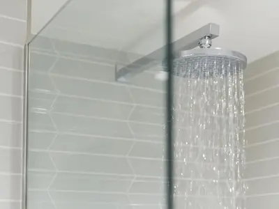 a shower with a shower head with a shower curtain at Apartment Juliot by Interhome in St Ives