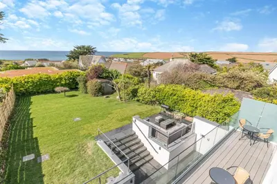 an aerial view of a house with a garden at 4 Bed in Trevone oc-p28959 in St Merryn