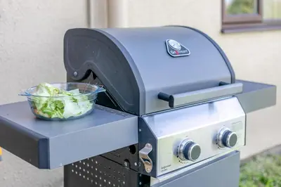 a grill with a bowl of lettuce on it at 2 Bed in St. Merryn oc-l29063 in St Merryn