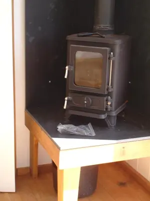 a stove sitting on top of a table at Honeysuckle hut in Port Isaac