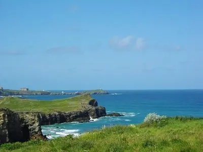 a view of the ocean from a cliff with the ocean at Porth Lodge in Newquay