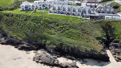 an aerial view of a house on the beach at 4 Glendorgal Sands, Newquay in Newquay