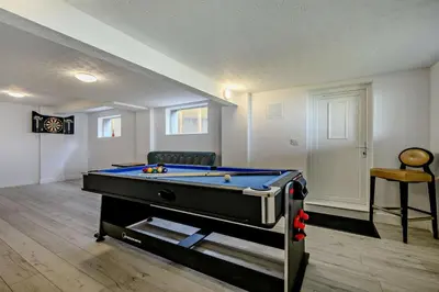 a living room with a pool table in it at 3 Bed in Downderry oc-s29364 in Downderry