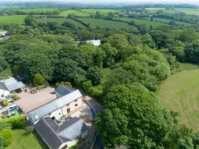 an overhead view of a house in the forest at Chy Lowen, Treluswell in Penryn