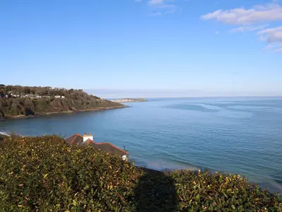 a view of a large body of water at Greenwood Apartment in St Ives