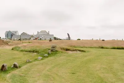 a field with some rocks in the grass at Wheal Tor - Free WiFi - Parking - Pet Friendly - On-site Activities in Helston