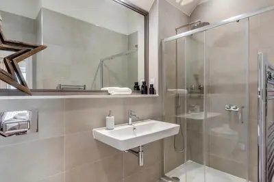 a bathroom with a sink and a shower at 2 Bed in Padstow oc-t29016 in Padstow