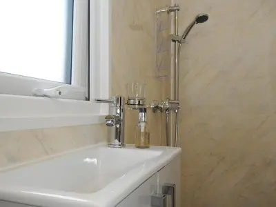 a bathroom with a sink and a shower at Rowan in Launceston