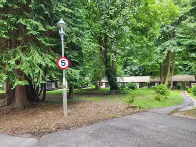 a street light with a no parking sign on it at Bumbeldink in Uny Lelant