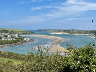 a view of a beach with boats in the water at Tidal Heights in Padstow