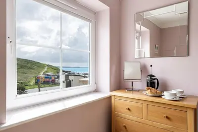 a window with a view of the ocean from a room at 3 Waves in Newquay