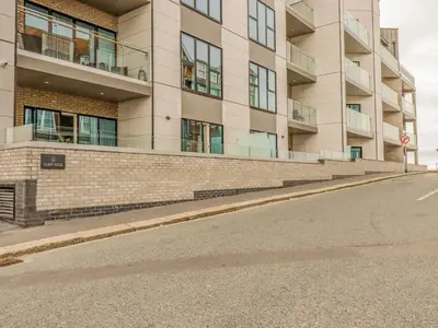 an empty street in front of a building at 17 Cliff Edge in Newquay
