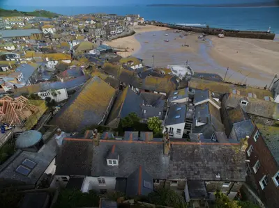 an aerial view of a town and the beach at Admiral Cottage in St Ives