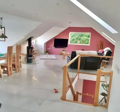a living room with a bunk bed and a tv at Harber Rise House in Carlyon Bay