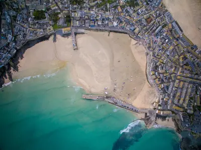 an aerial view of a beach and the ocean at Birdsong in Carbis Bay