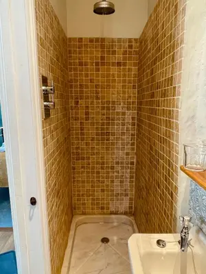 a bathroom with a sink and a toilet at The Old Wood Store in Helston