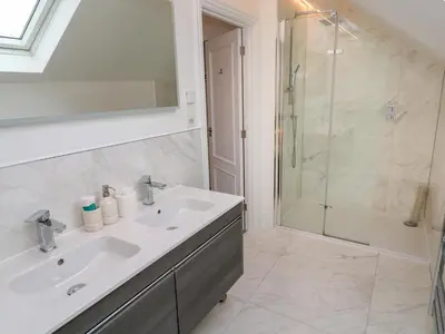 a bathroom with a sink and a shower at Amelia's Point in St Ives