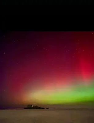 an image of the northern lights in the sky at Seven Bays in Newquay