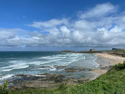 a view of a beach with the ocean at 30 Bredon Court at Fistral Beach Newquay in Newquay