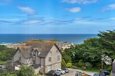 a house with a view of the ocean at Finest Retreats - Number 10 Porthmeor in St Ives
