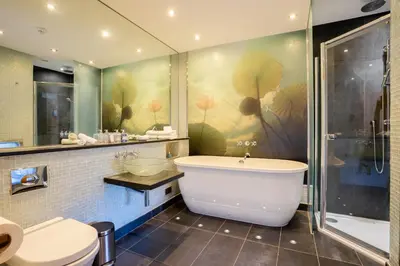 a bathroom with a tub and a shower and a toilet at Prospect House in Padstow
