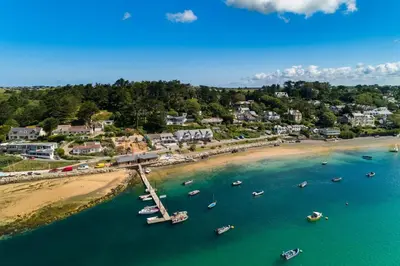 an aerial view of a beach with boats in the water at 2 Bed in St. Minver oc-r29475 in Saint Minver