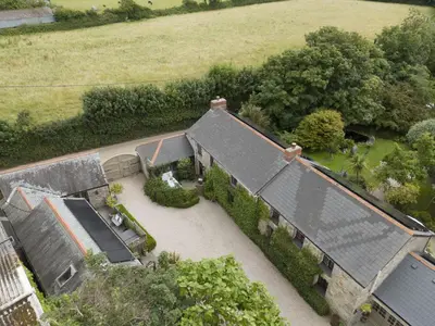 an overhead view of a house with a garden at The Corner Cottage in Camborne