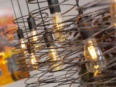 a bunch of wire lights hanging from a ceiling at Avon Cottage in St Ives