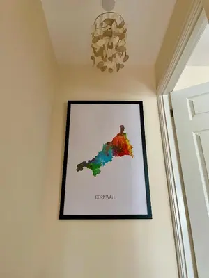 a framed map of colombia hanging on a wall at The Coach House in Par