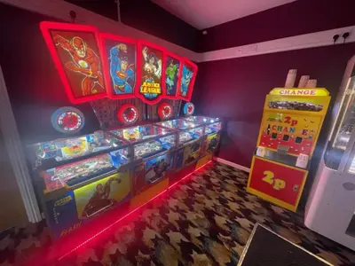 a room with a pinball machine and some games at 3 Bedroom lodge Hengar Manor sleeps 6 115 in Michaelstow