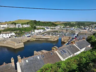 a view of a town with a bridge over a river at Loe Bar Top in Porthleven