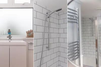 a bathroom with a shower and a sink at Benjamin's Bolthole in St Ives
