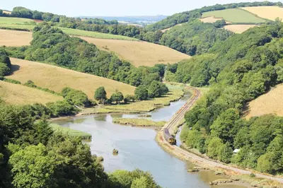 an aerial view of a river in the countryside at Swallows Rest Cottage - 3 Bedrooms - Nr Looe in Looe
