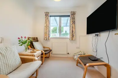 a living room with a flat screen tv at 4 Bed in Newquay oc-b29882 in Newquay