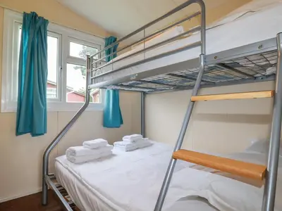 a bedroom with bunk beds in a dorm room at Fox Cove in Padstow