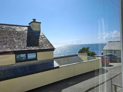a view of the ocean from a house at Loe Bar Bottom in Porthleven