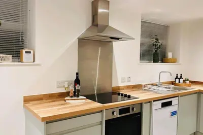 a kitchen with a sink and a counter top at St Mary's Mews in Truro
