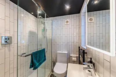 a bathroom with a toilet and a sink at 3 Bed in Fowey oc-p29280 in Fowey